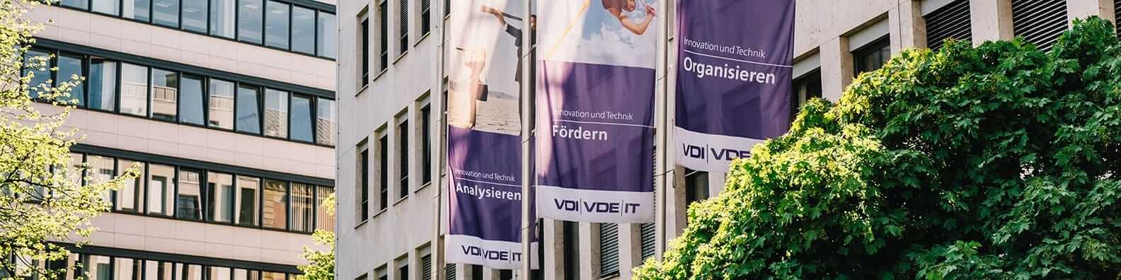 Outdoor corporate flags with VDI/VDE IT branding