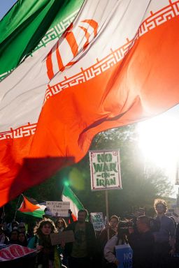 Demonstrators protest against military action in Iran, outside the White House on Tuesday, after US President Donald Trump said that he had agreed to a two-week ceasefire.